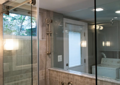 Shower Close-up in Master Bathroom Suite with Glass Enclosure and Doors